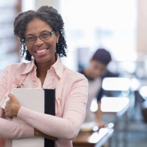 African American professor prepares for class