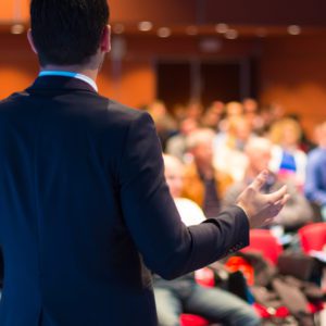 Speaker presenting at business seminar